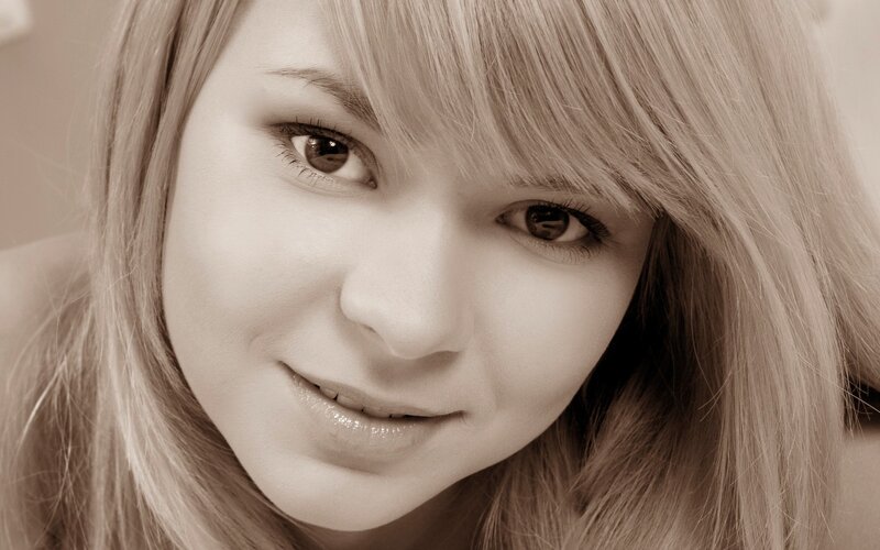 close-up portrait of a smiling woman