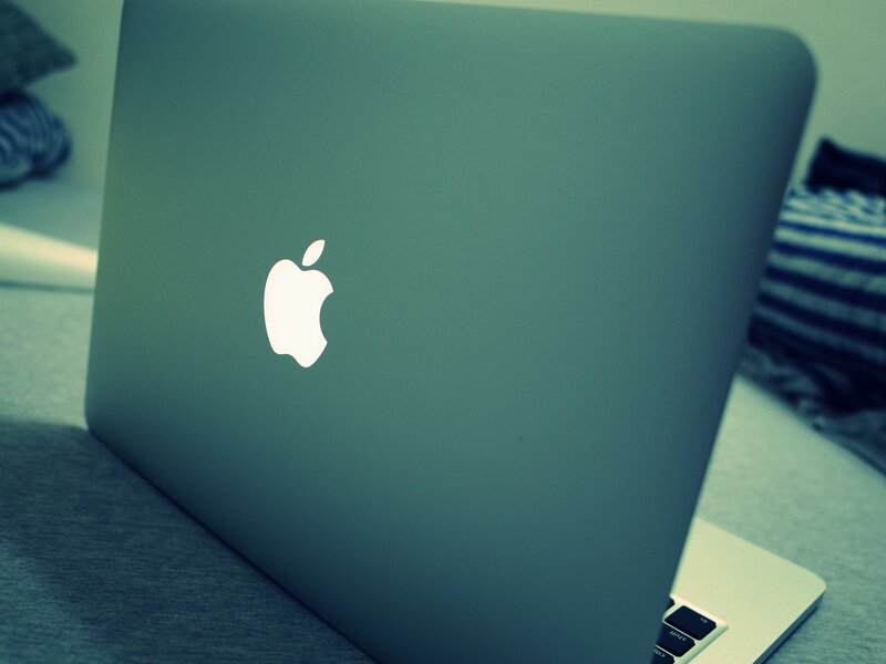 Closed Laptop on Bed