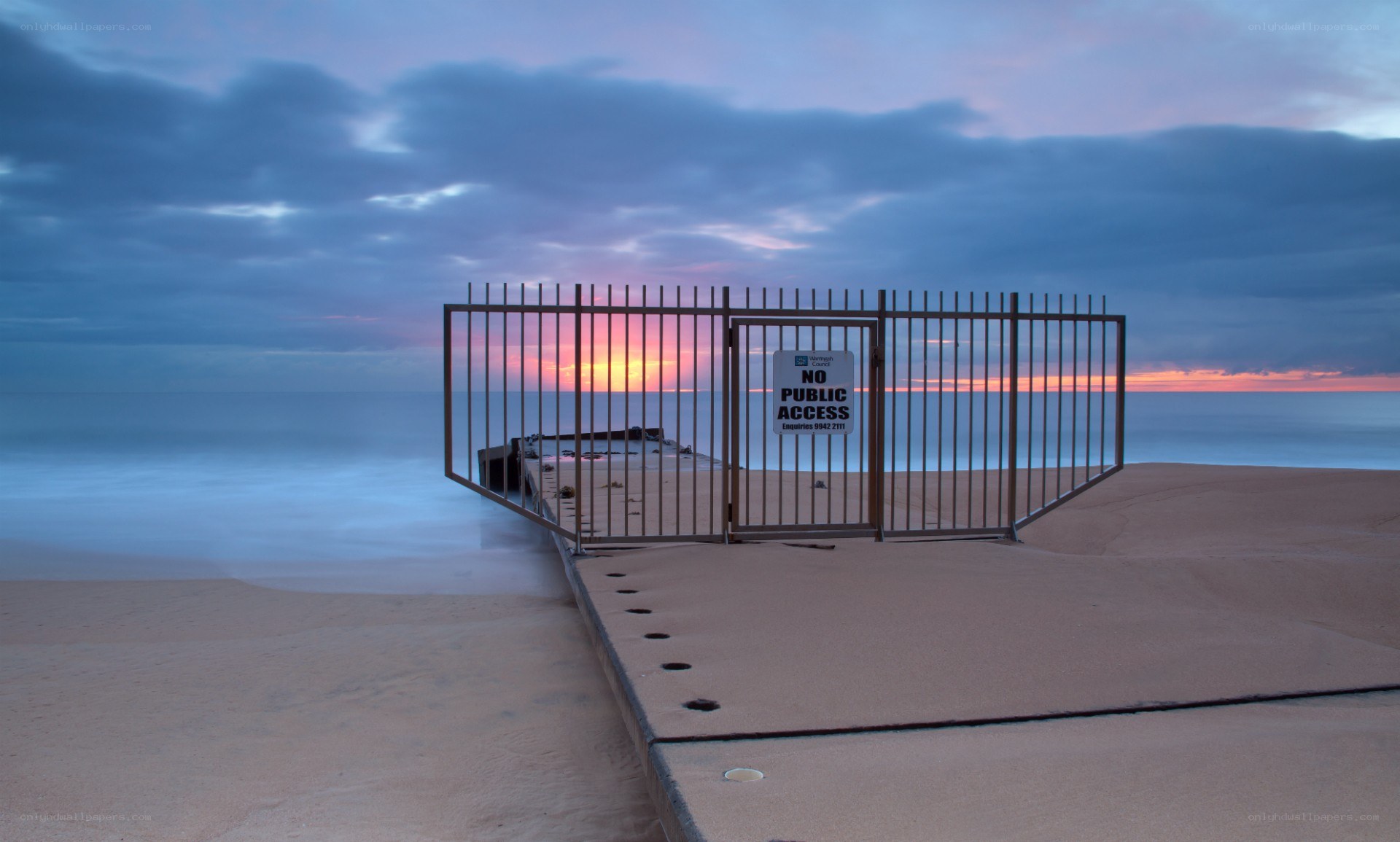 Closed pier at sunset