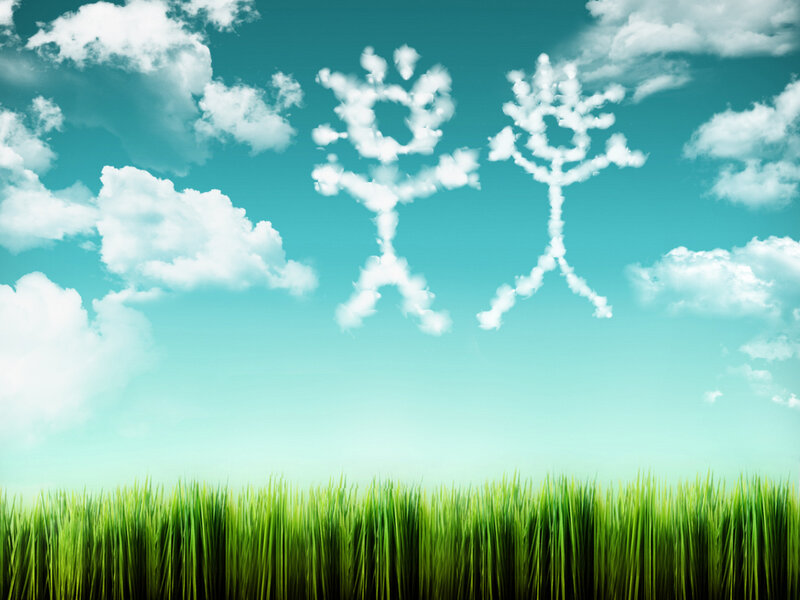 Cloud figures in a green field