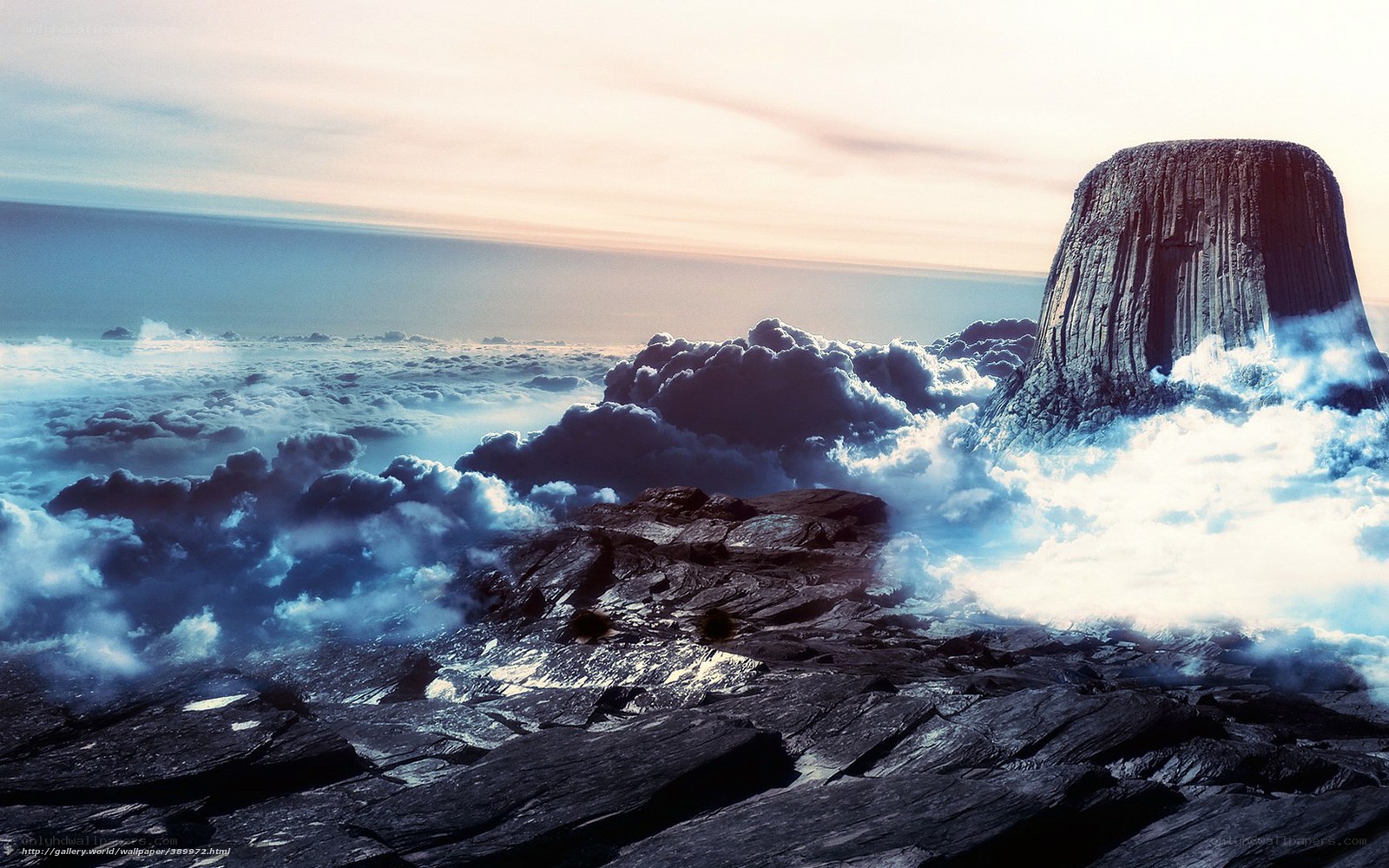 Clouds above a rocky peak