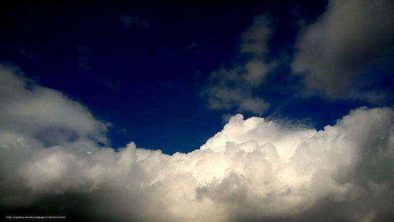 Clouds against a blue sky