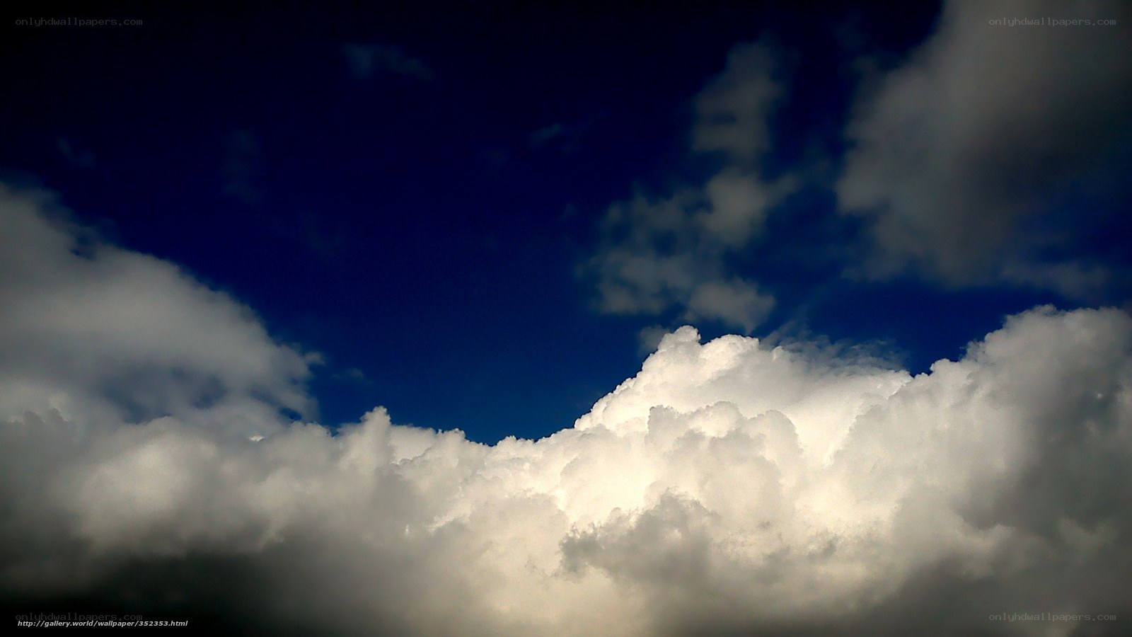 Clouds against a blue sky
