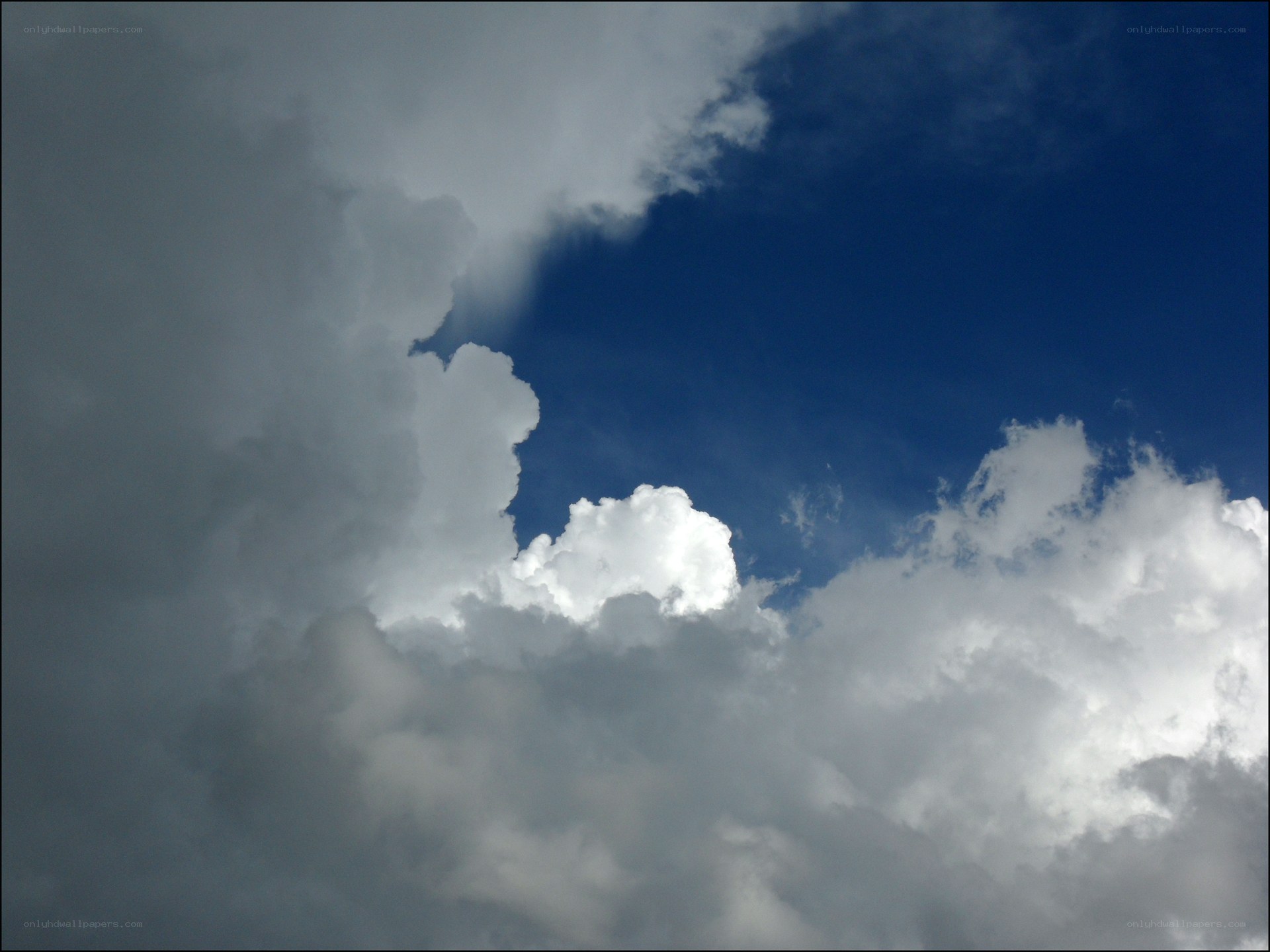 Clouds against blue sky