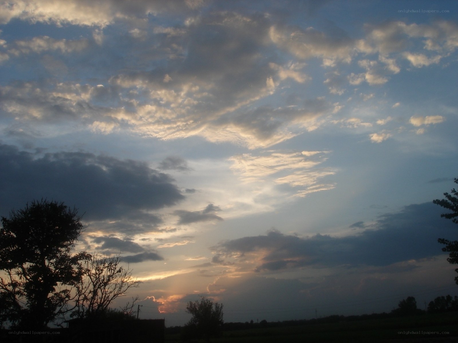 Clouds at dusk over a field