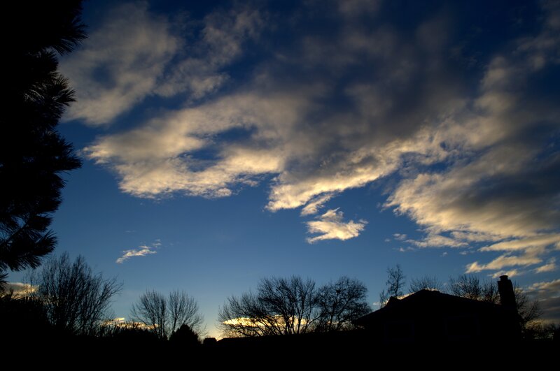 clouds at dusk over a house