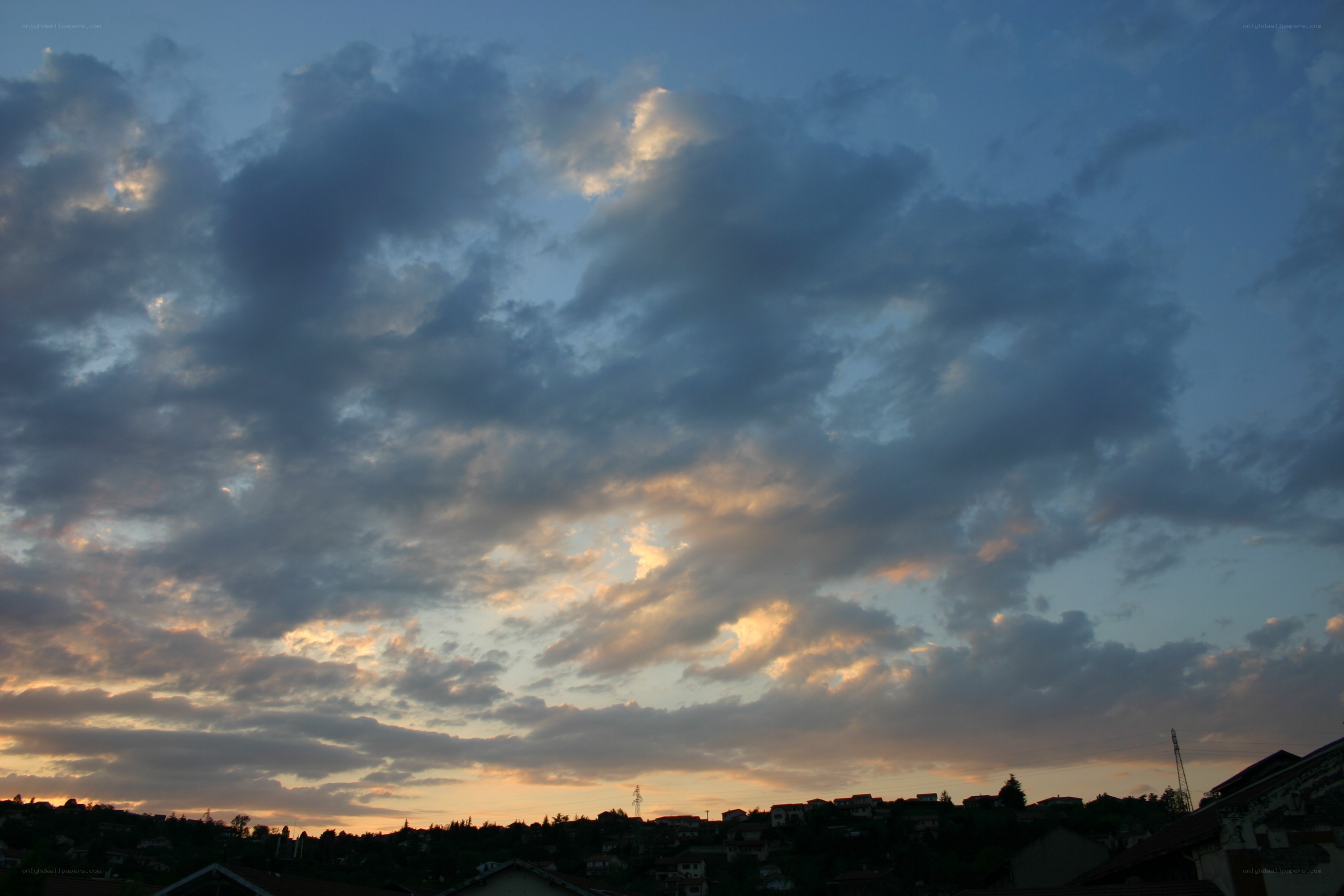 Clouds at dusk over a town