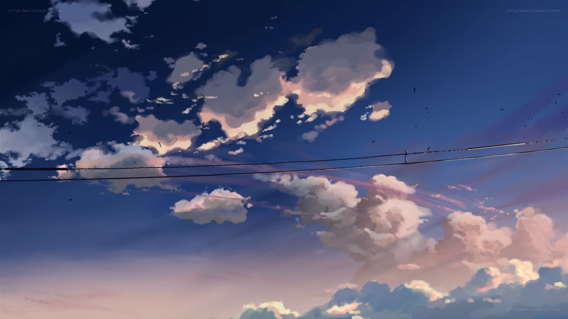 clouds at dusk with power lines