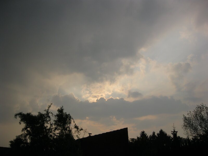 clouds at dusk with sunbeams