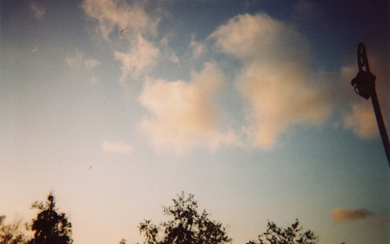 clouds at dusk with trees