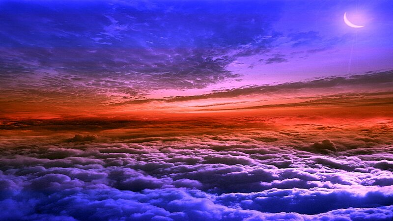 clouds at sunset with crescent moon