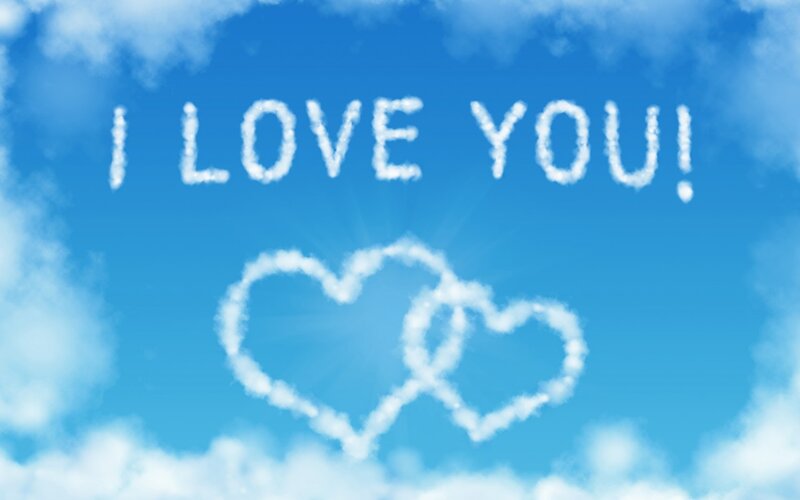 Clouds Forming Text and Hearts