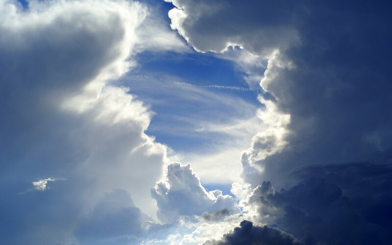 Clouds framing blue sky