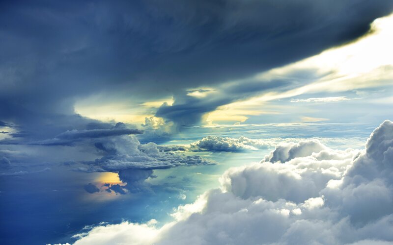 Clouds from Above — Blue, Dramatic, Afternoon