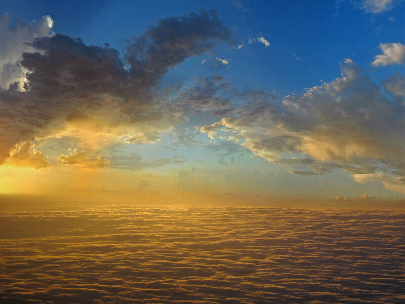 Clouds from Above — Blue, Serene, Sunset, Photograph, Sky, Sunlight, Yellow