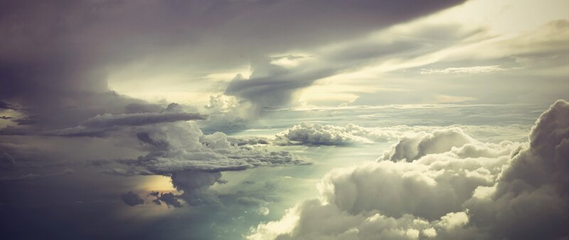 Clouds from Above — Gray, Dramatic, Sunset