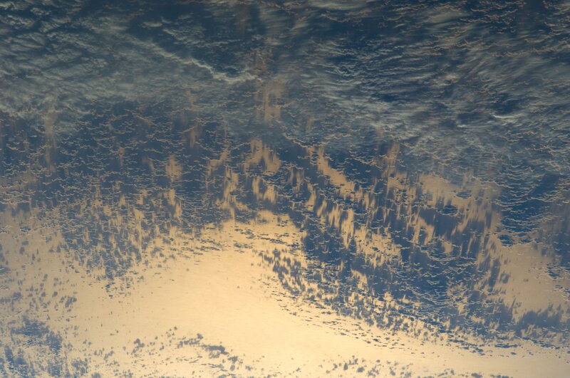 Clouds from space at sunset