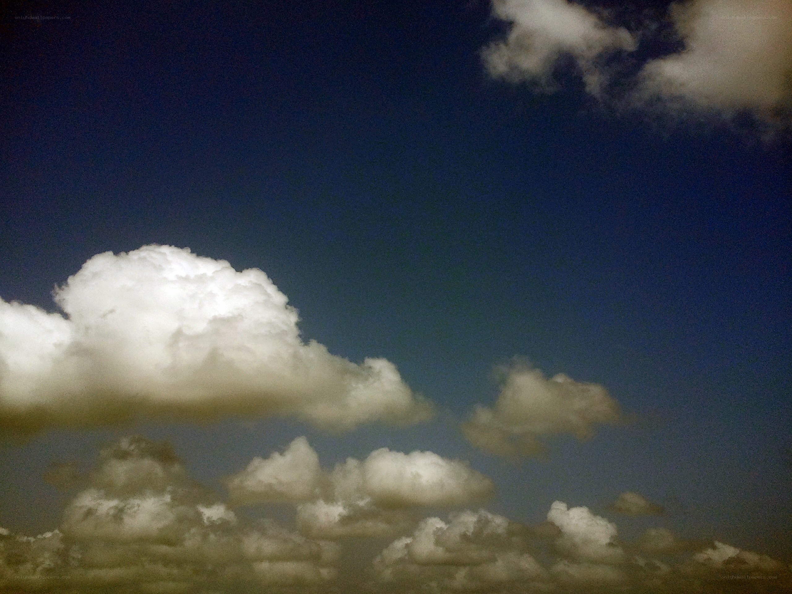 Clouds in a dark sky