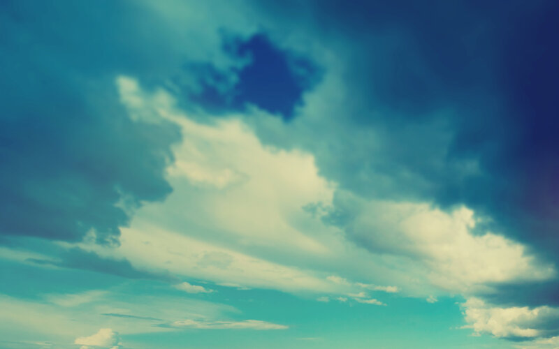 Clouds in a teal sky