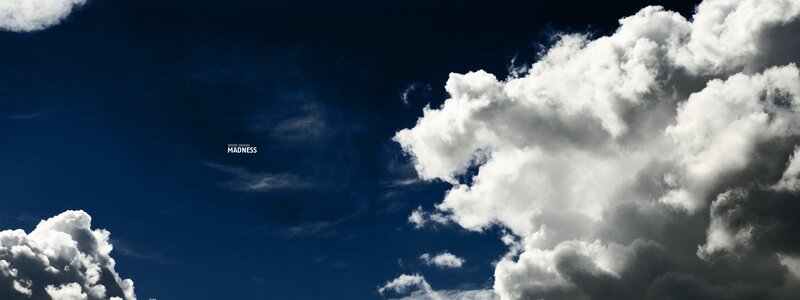 Clouds in Blue Sky — Dramatic, Afternoon, Photograph, Text