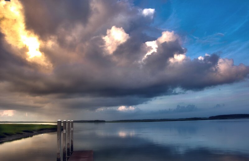 Clouds over a Calm Bay
