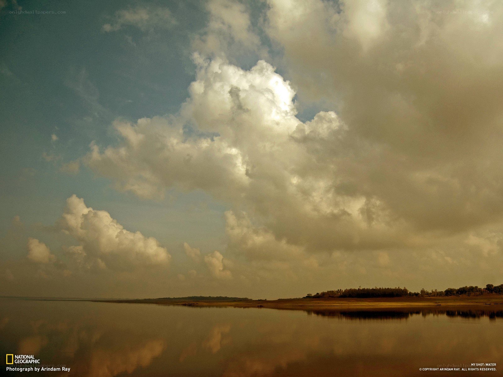 Clouds over a calm lake