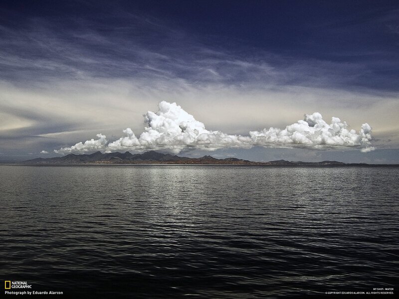 Clouds over a distant island