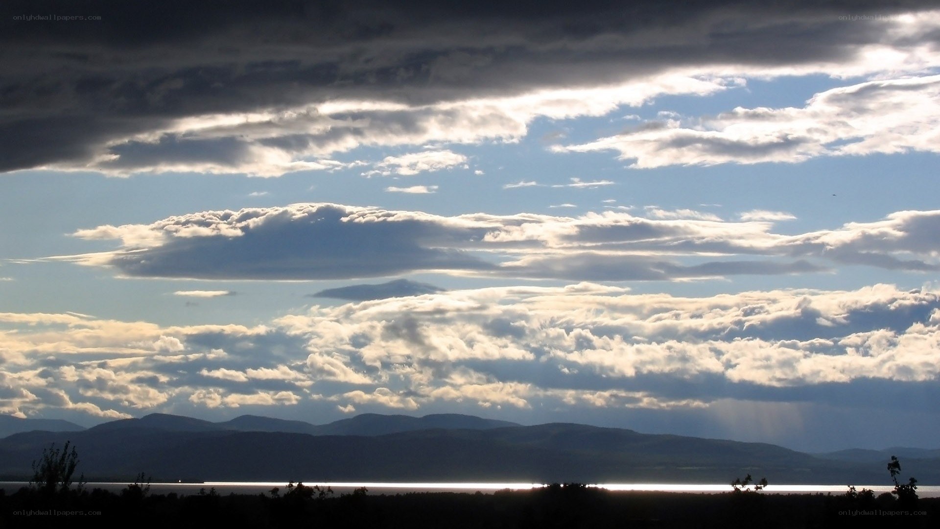 Clouds over a lake at sunset