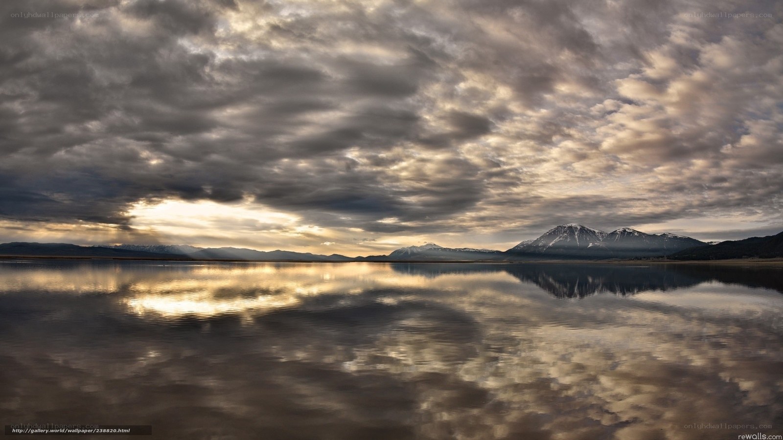 Clouds over a mountain lake