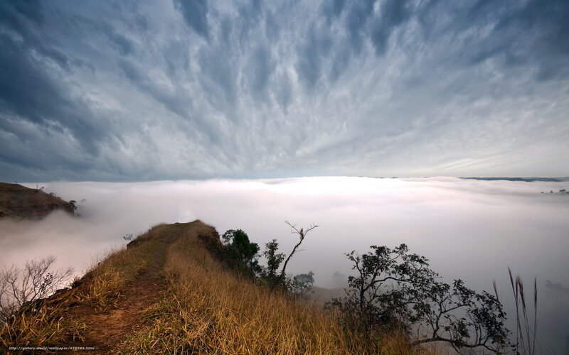 Clouds over a mountain ridge