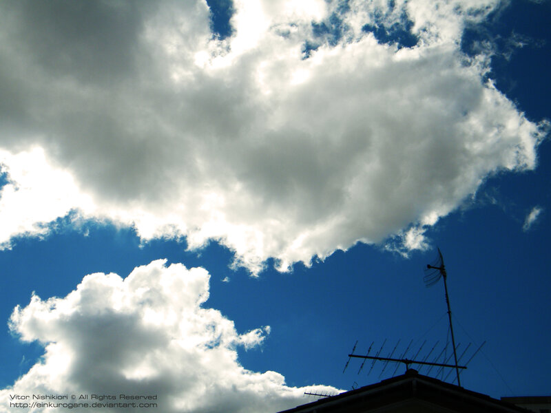 Clouds over a rooftop