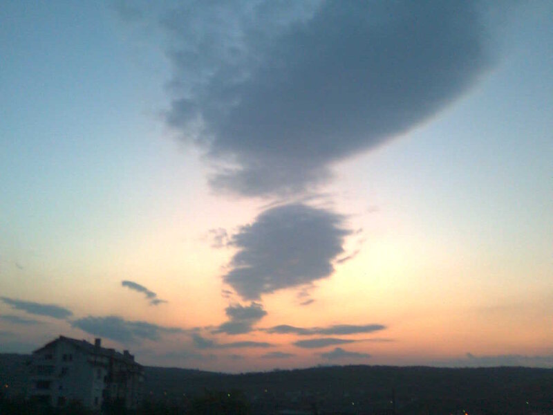 Clouds over City Skyline — Blue, Dramatic, Sunset