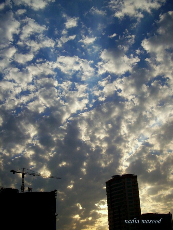 Clouds over city skyline
