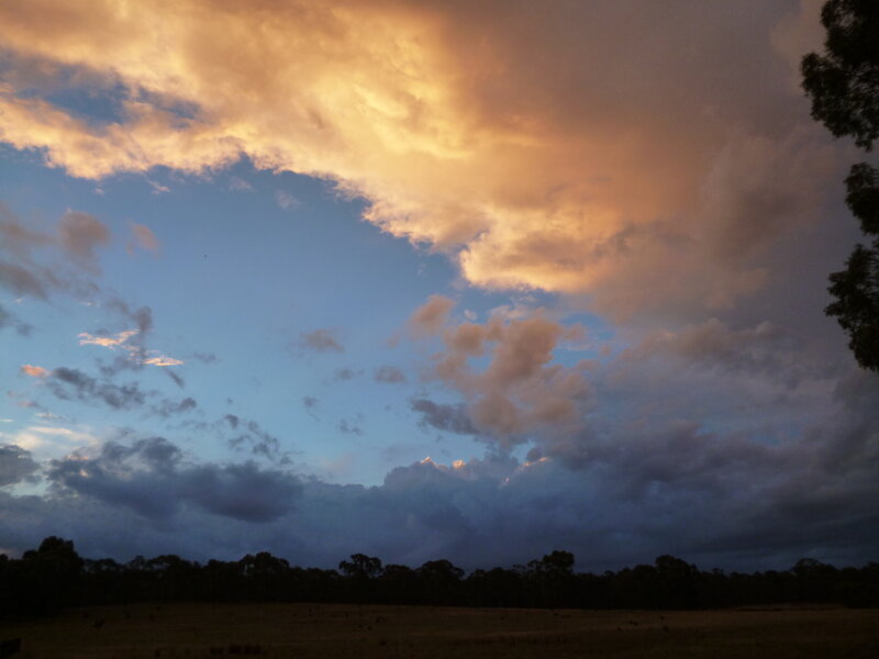 Clouds over Field at Dusk