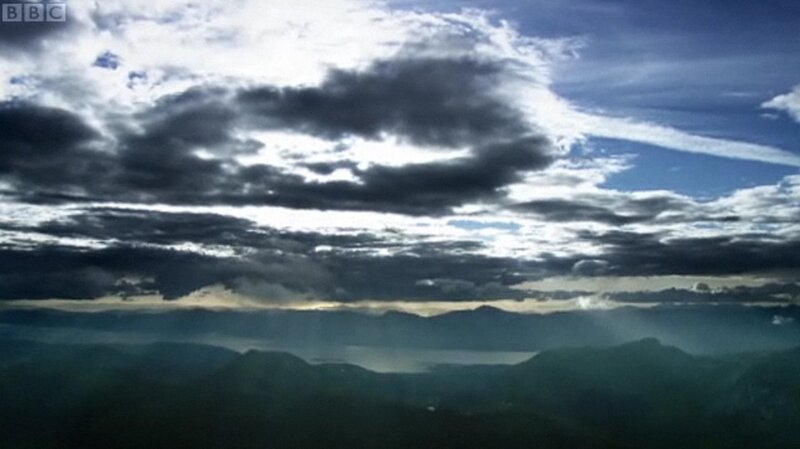 Clouds over mountain landscape