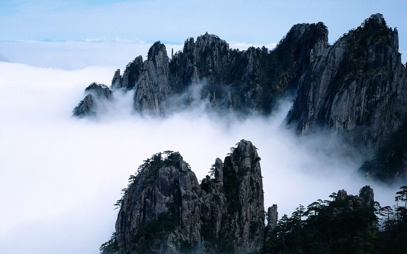 Clouds over mountain peaks