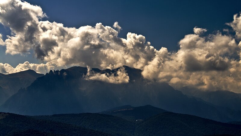 Clouds over mountain peaks