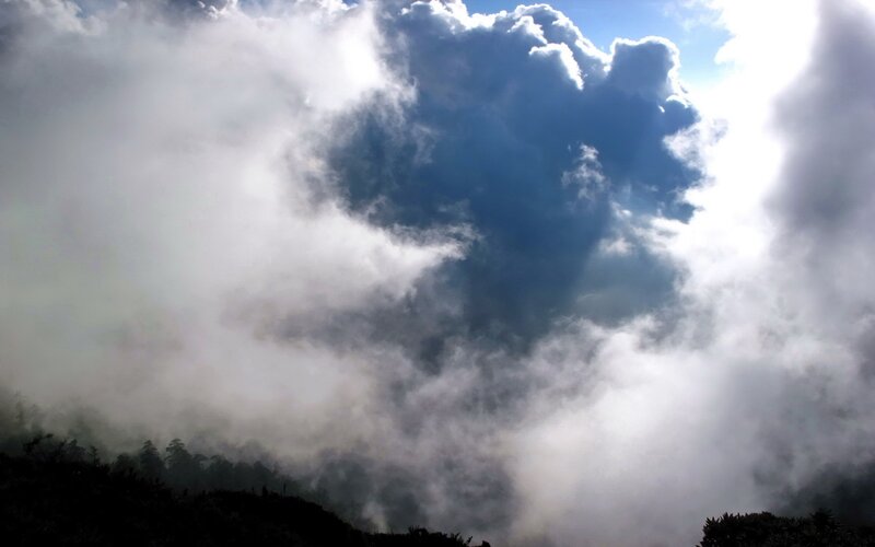 clouds over mountain peaks