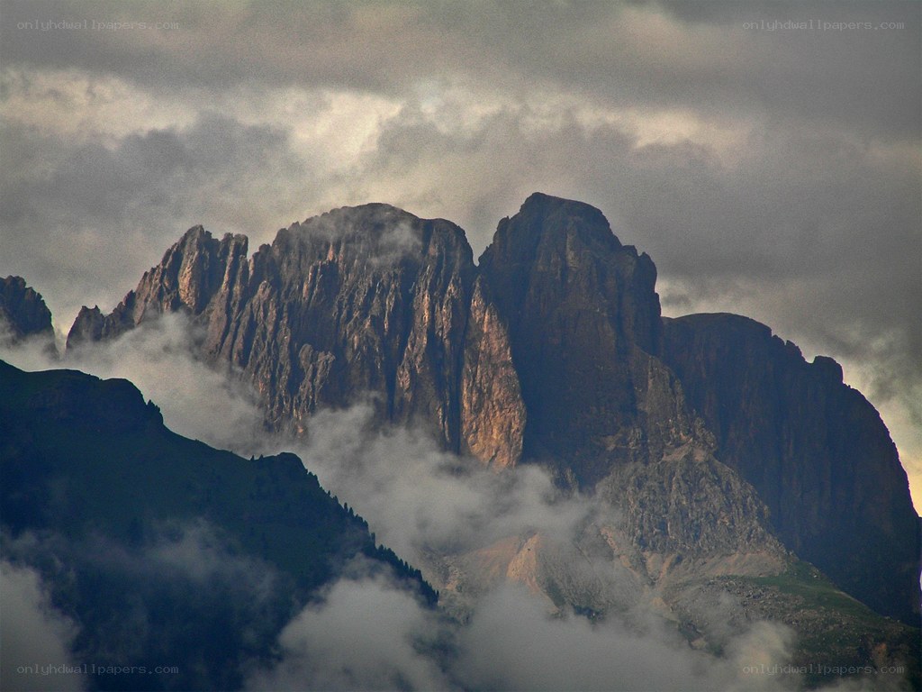 Clouds over mountain peaks