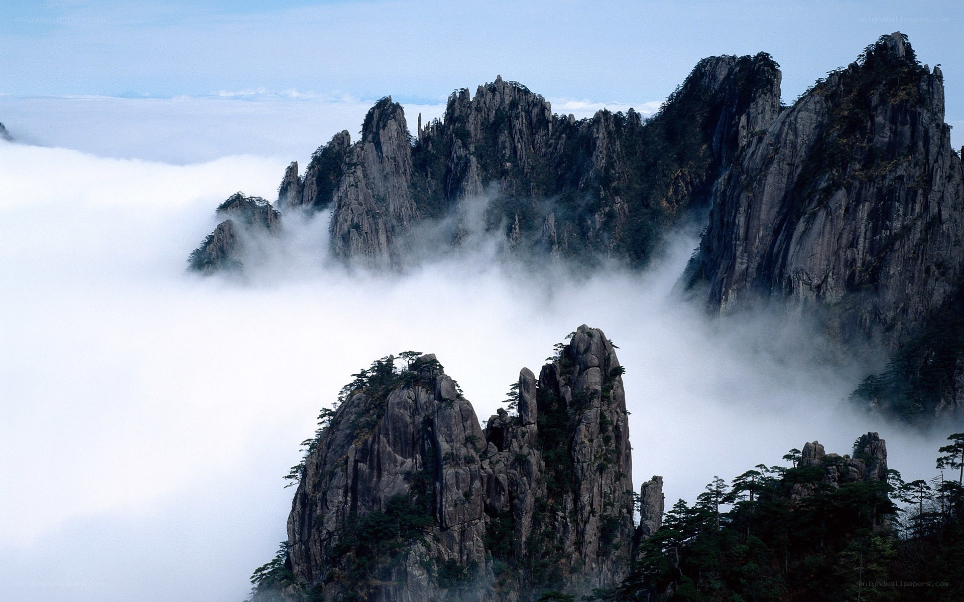 Clouds over mountain peaks
