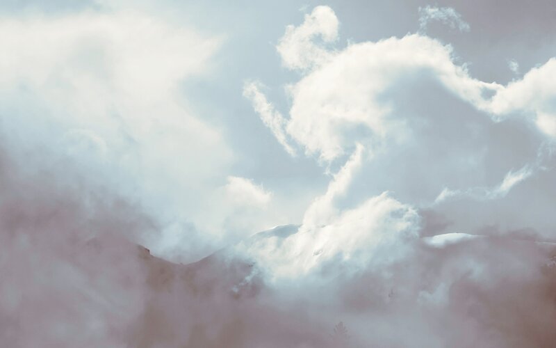 clouds over mountain peaks