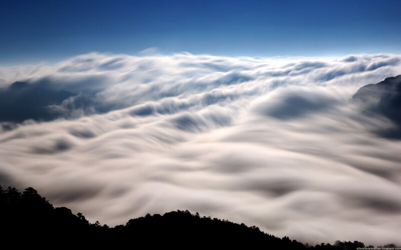 Clouds over Mountain Peaks — Blue, Serene