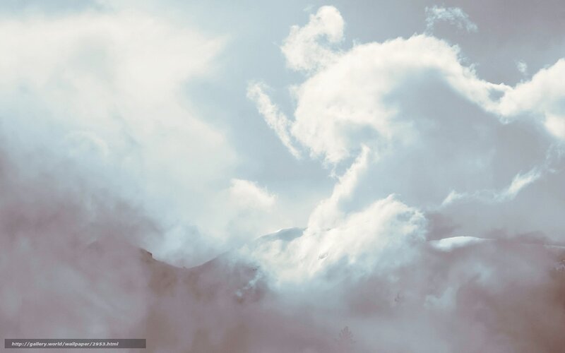 Clouds over mountain peaks