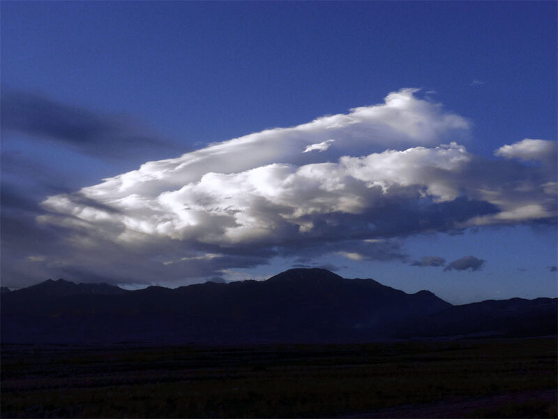 Clouds over mountain range