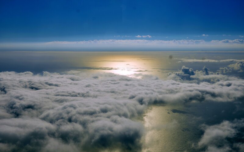 Clouds over Ocean — Blue, Serene, Sunset, Photograph, Sunlight