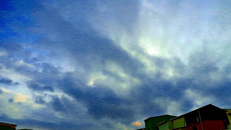 Clouds over rooftops