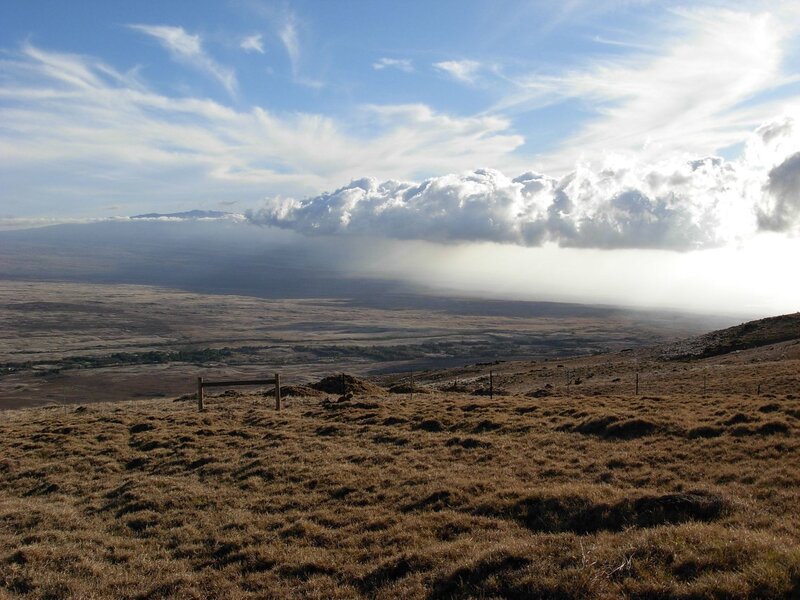 Clouds over volcanic landscape