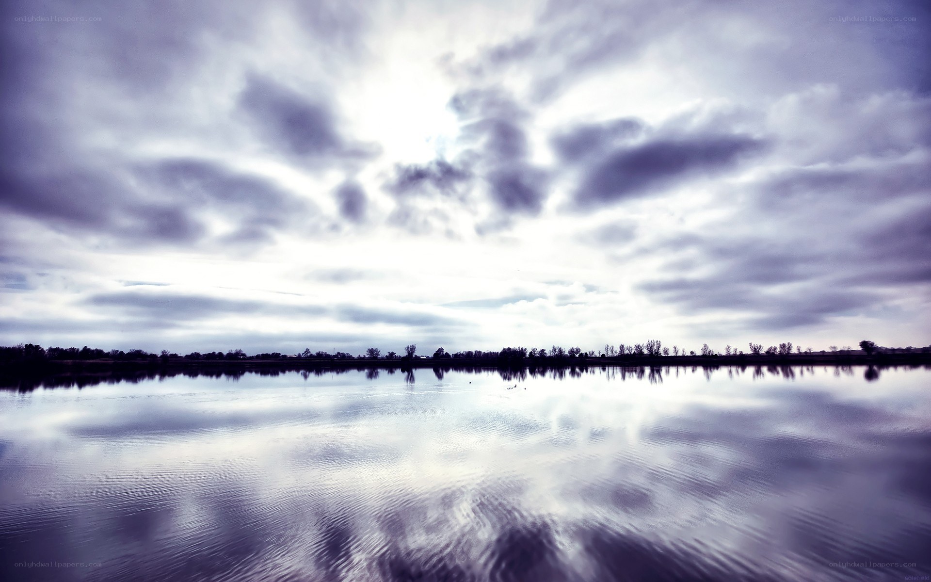 Clouds reflected in a calm lake