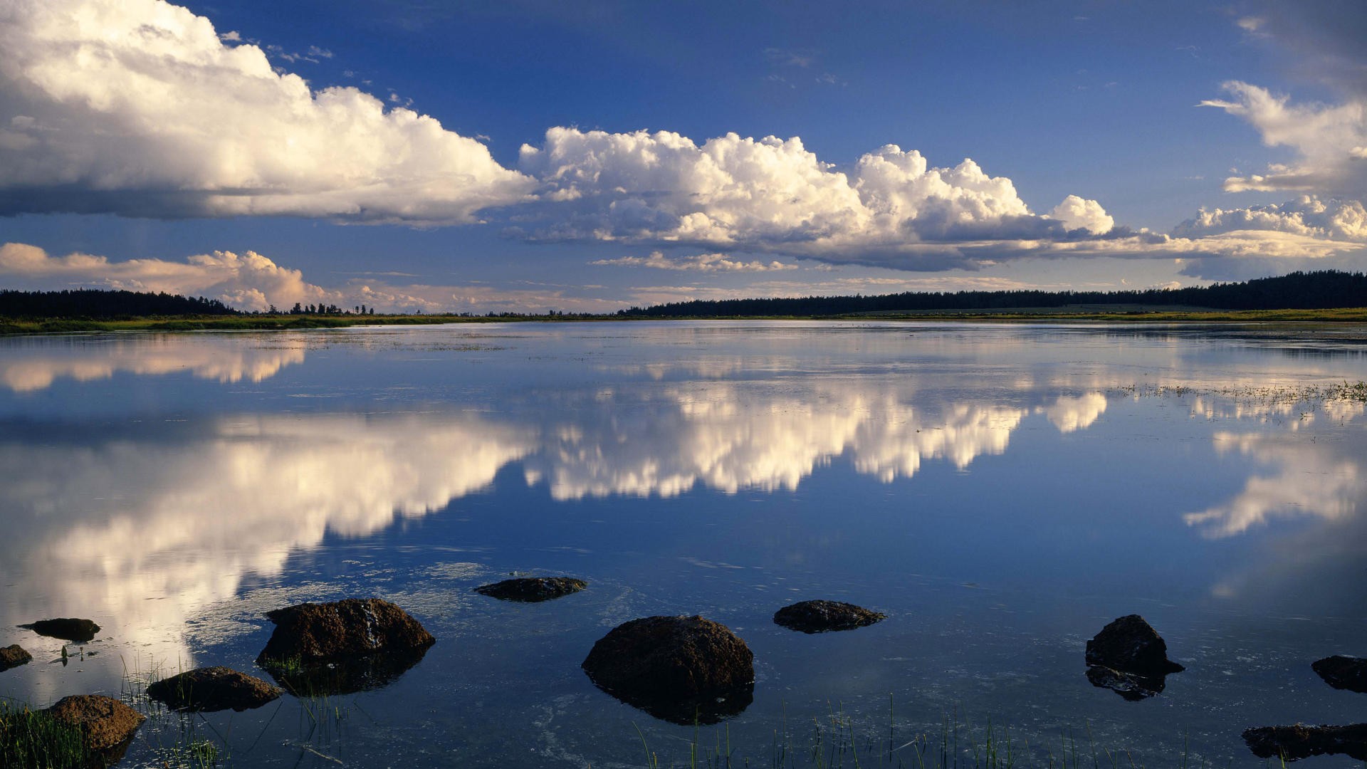 Clouds reflected in a calm lake
