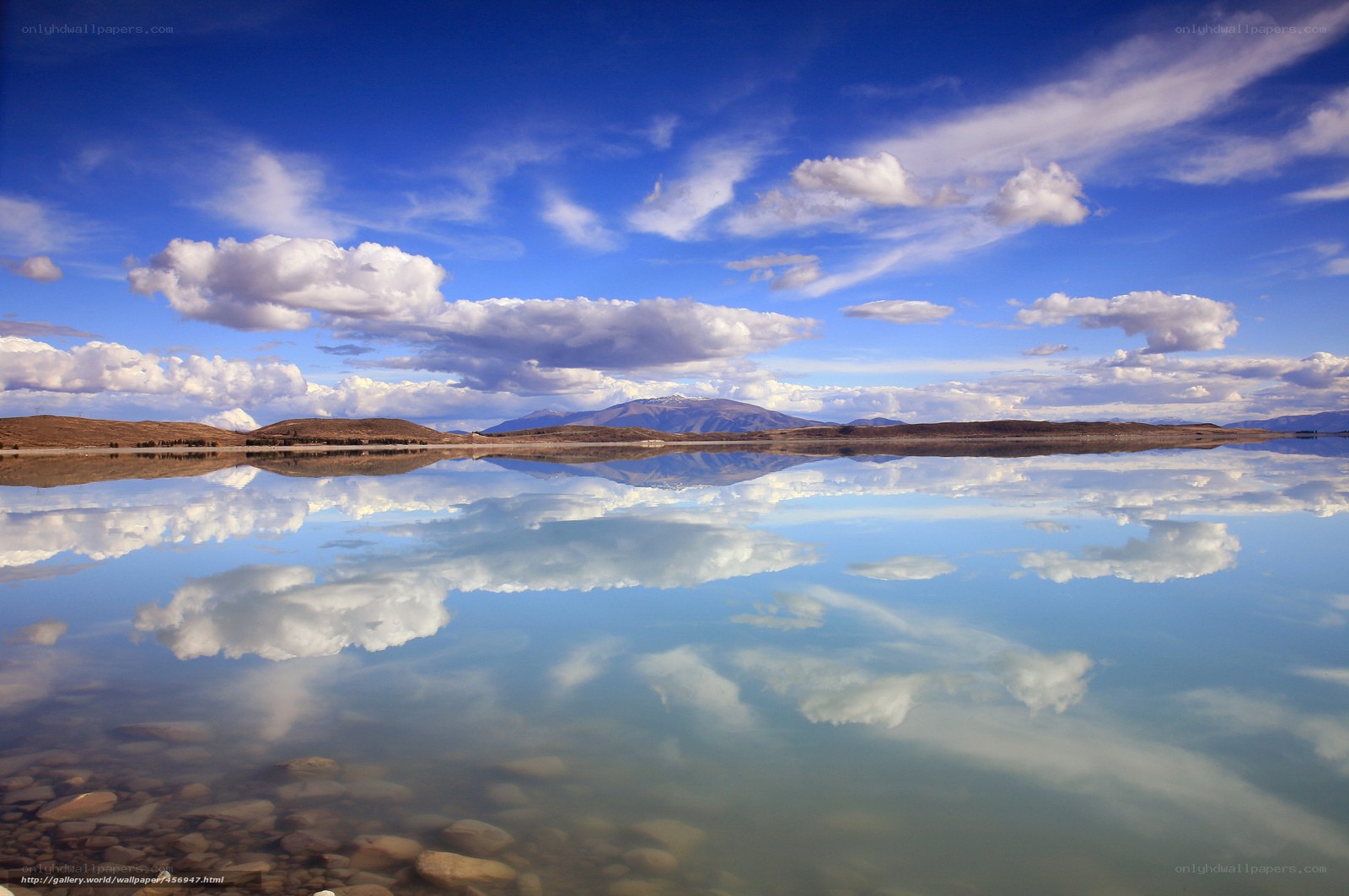 Clouds reflected in a calm lake